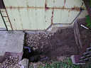 [thumbnail of what the buried plumbing and spliced in wall panels looked like after the main dirt excavation work.]